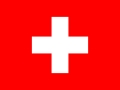 La bandera de Suiza presenta un fondo rojo con una cruz blanca en el centro.
