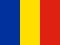 La imagen muestra la bandera de Rumania con franjas verticales de azul, amarillo y rojo.