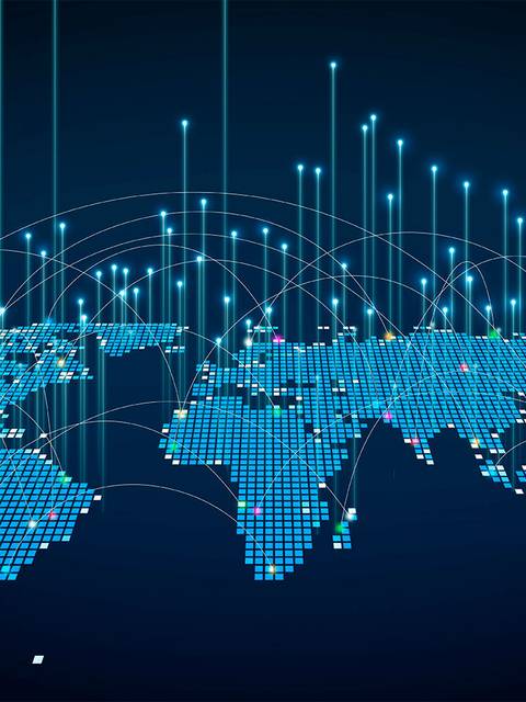 Un mapa del mundo representado en estilo digital con luces y conexiones entre diferentes puntos.